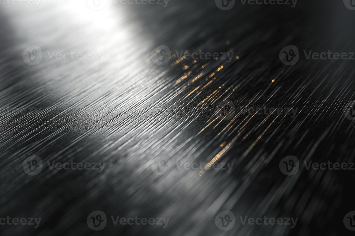 Close-up of a textured metallic surface with light reflections, showcasing intricate streaks and patterns. photo