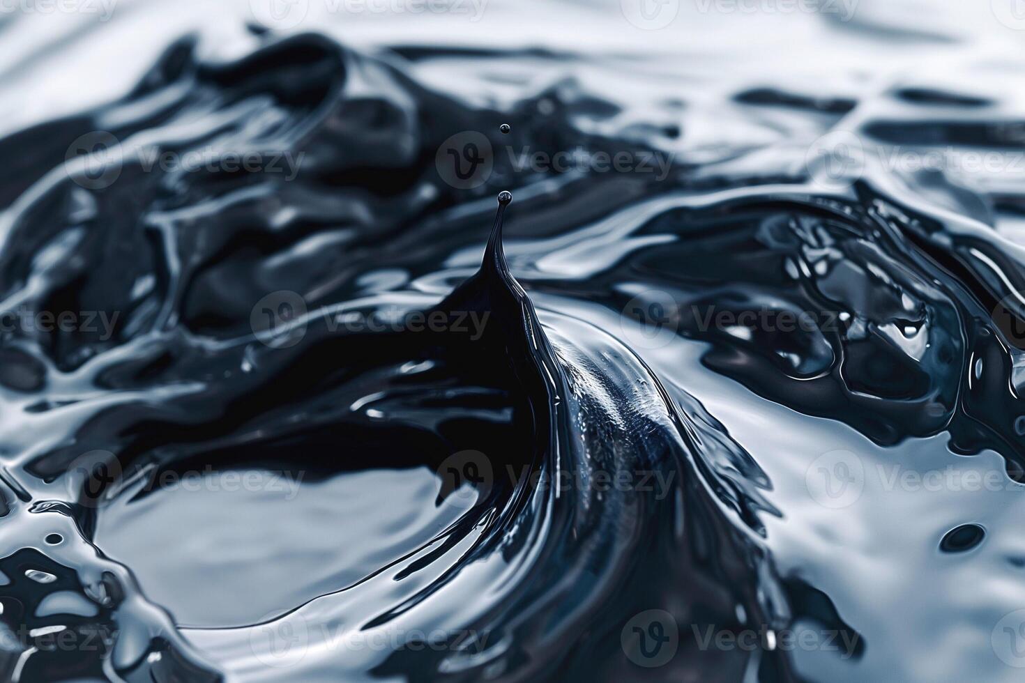 Close-up of swirling black liquid creating an elegant splash, showcasing dynamic movement and texture. photo