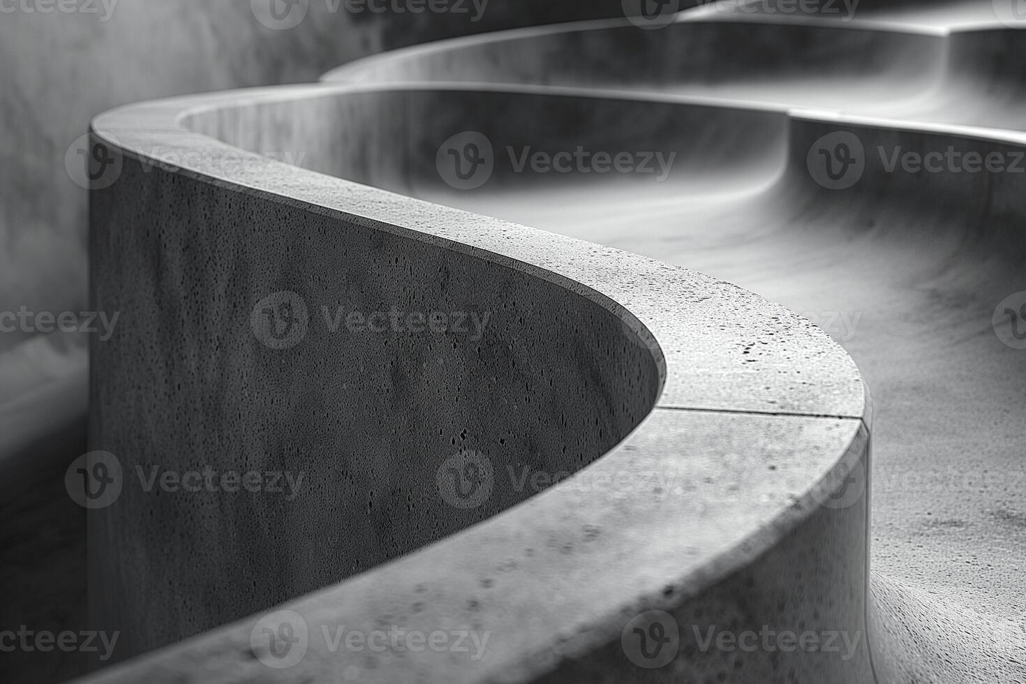 Close-up of a smooth, curved concrete structure, showcasing modern architecture and design. photo