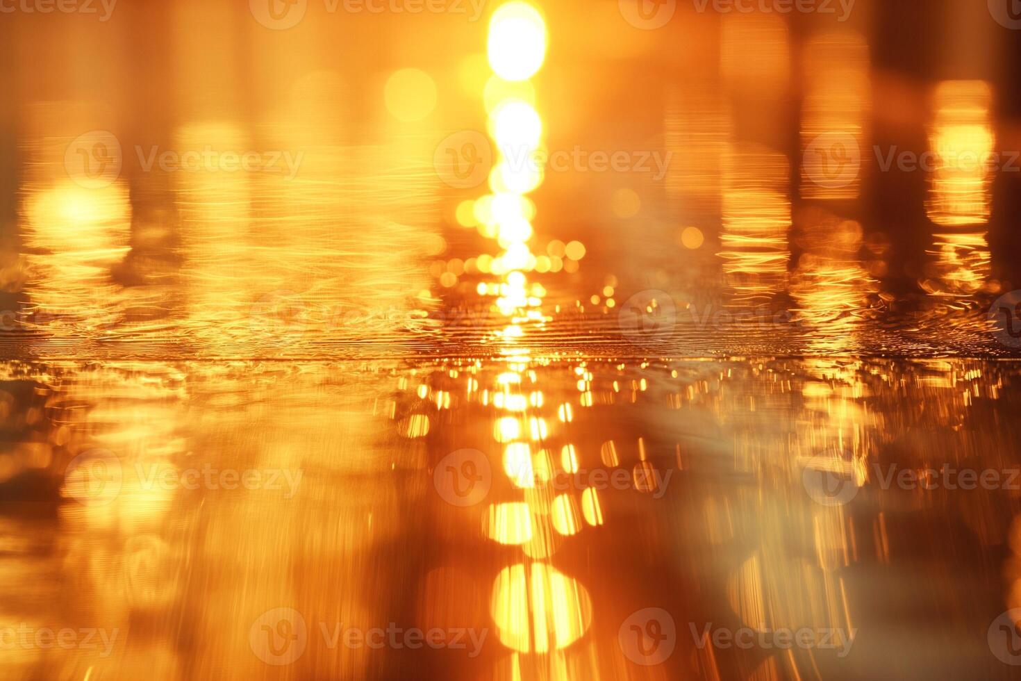Golden sunset reflections shimmering on the water's surface, creating a tranquil and mesmerizing scene. photo