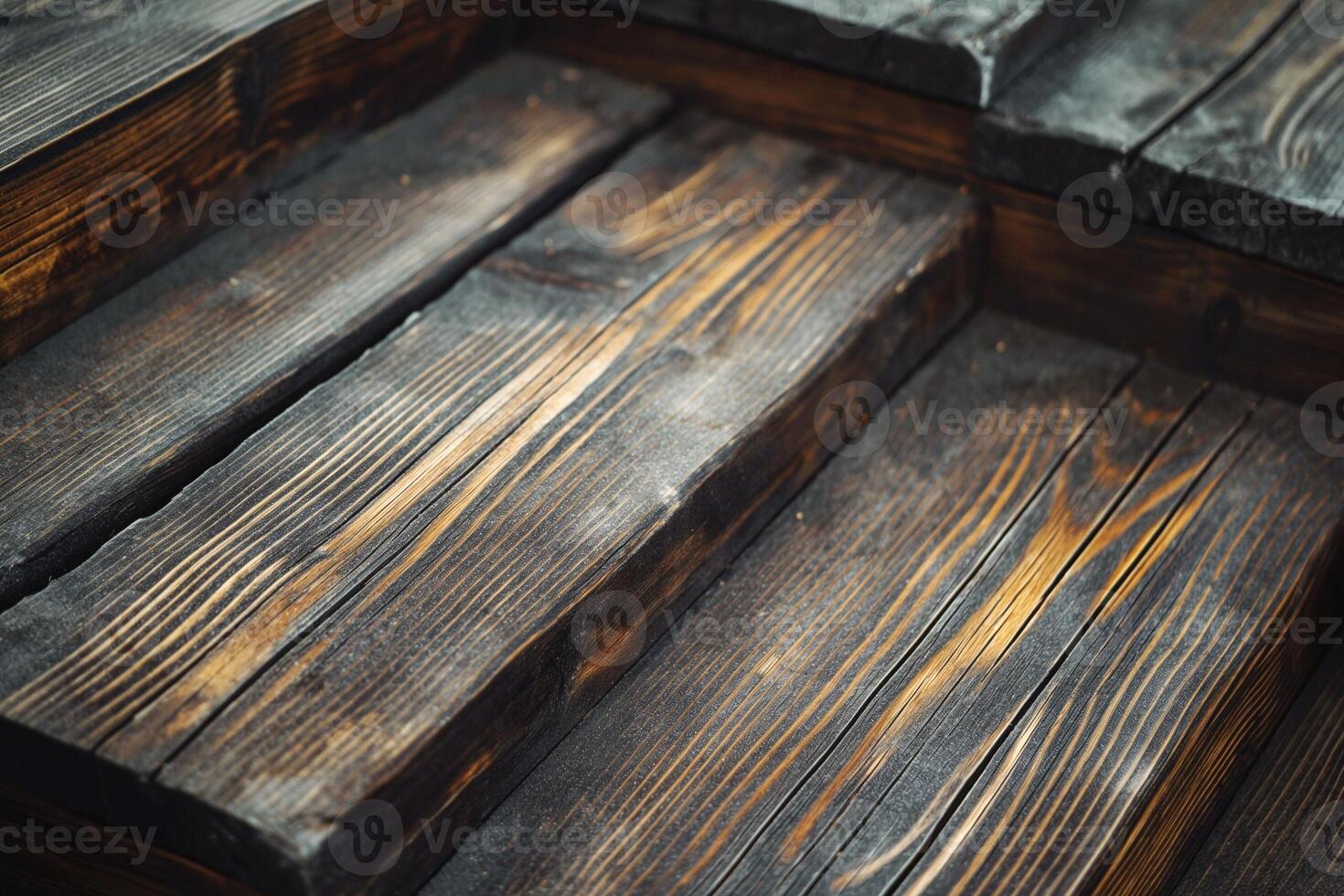 Close-up of dark wooden stairs showcasing rich grain patterns and textures. photo