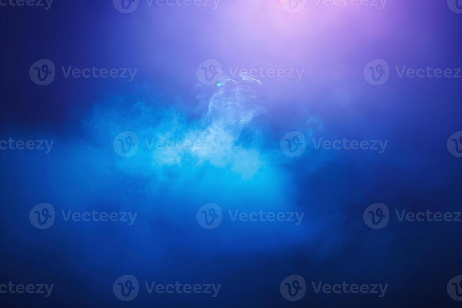 A mesmerizing blend of blue and purple smoke swirling in an ethereal dance, creating an otherworldly atmosphere. photo