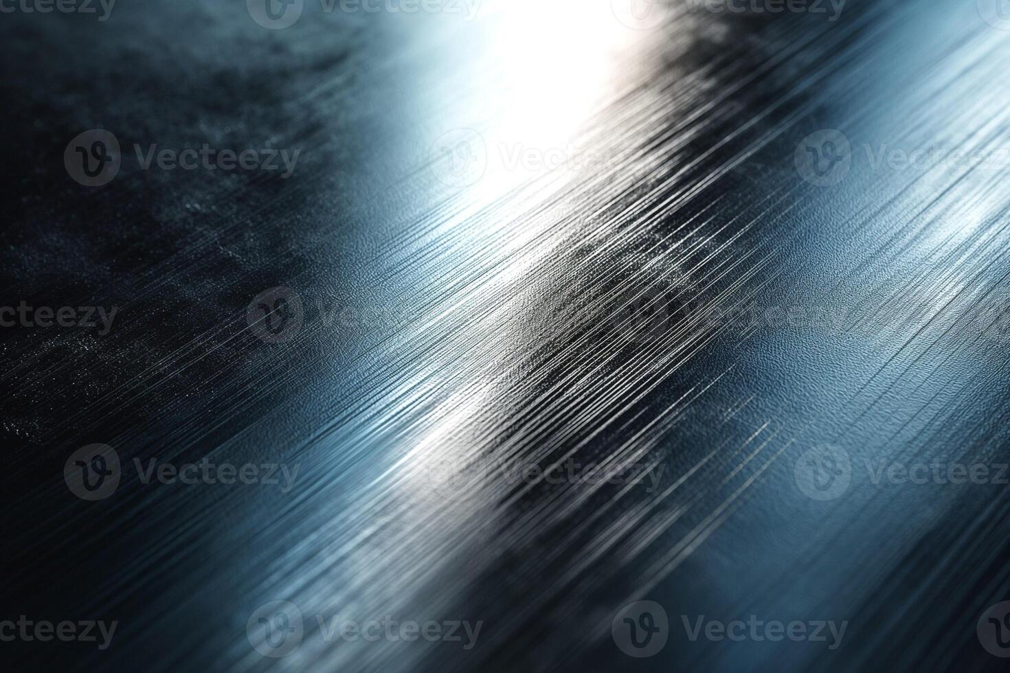 Close-up of a sleek, brushed metallic surface reflecting light, showcasing smooth texture and subtle patterns. photo