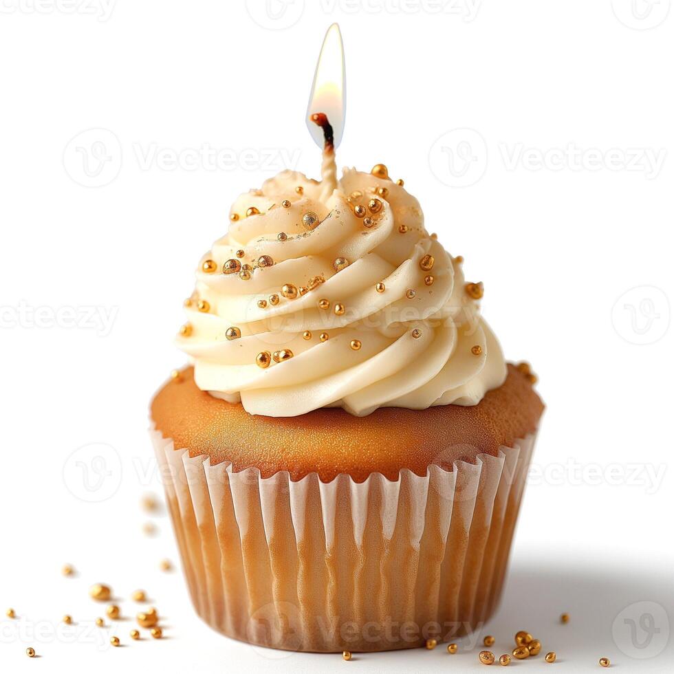 A delicious golden cupcake with creamy frosting and a lit candle, adorned with gold sprinkles, perfect for celebrations. photo