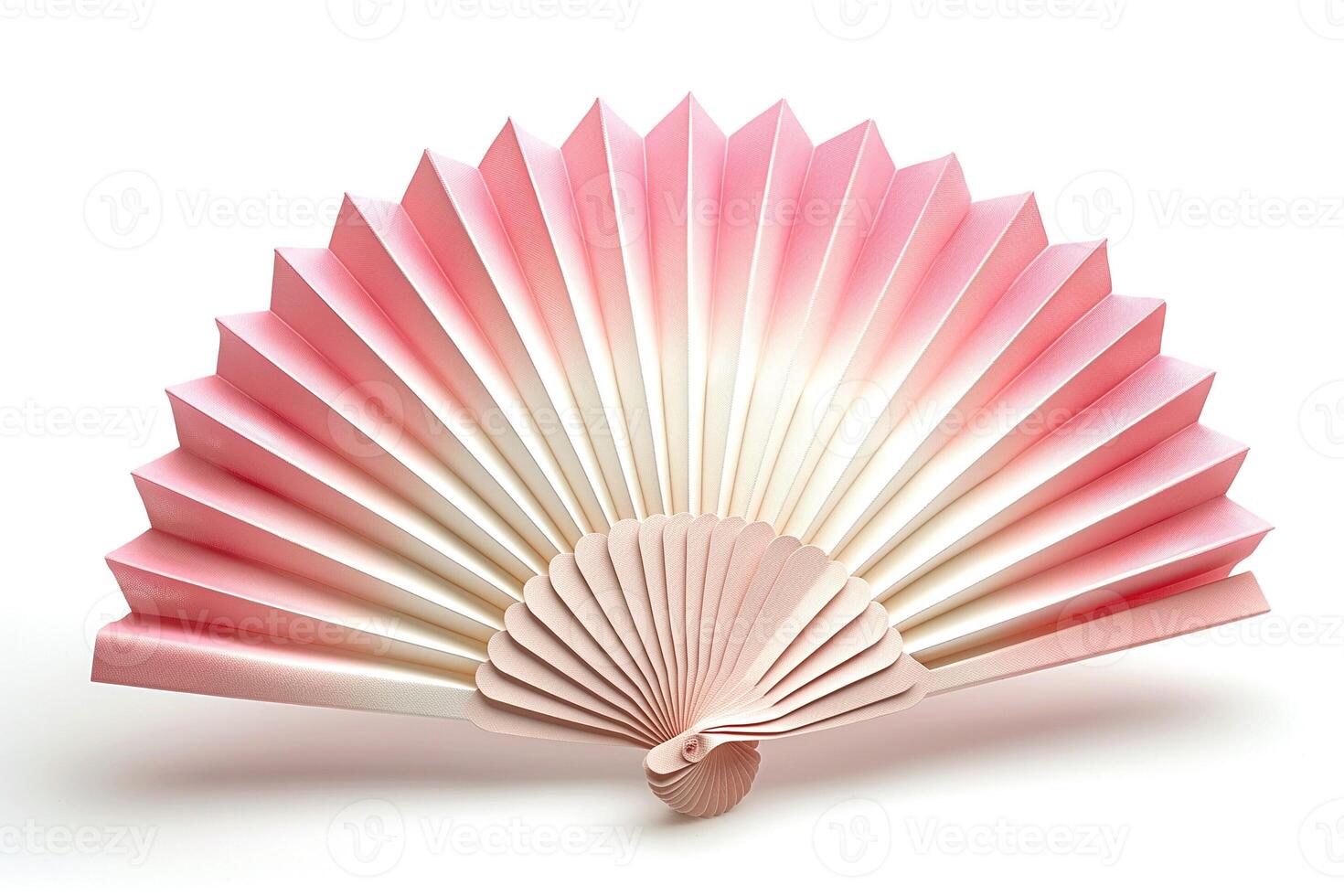 Elegant paper fan in soft pink hues, creating a serene and artistic atmosphere. photo