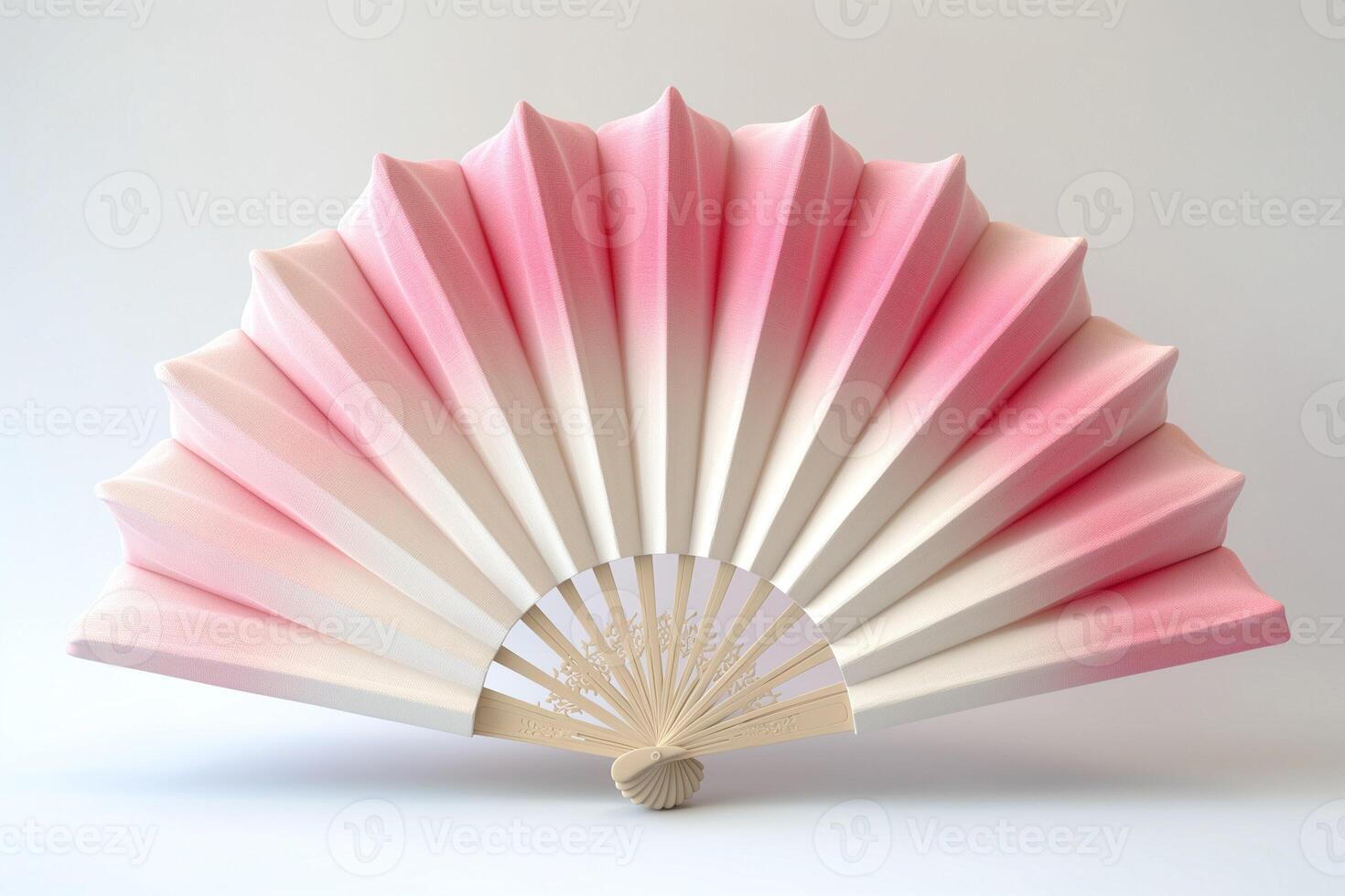 Elegant pink and white folding fan, showcasing intricate design and a smooth gradient, perfect for decor or cultural events. photo