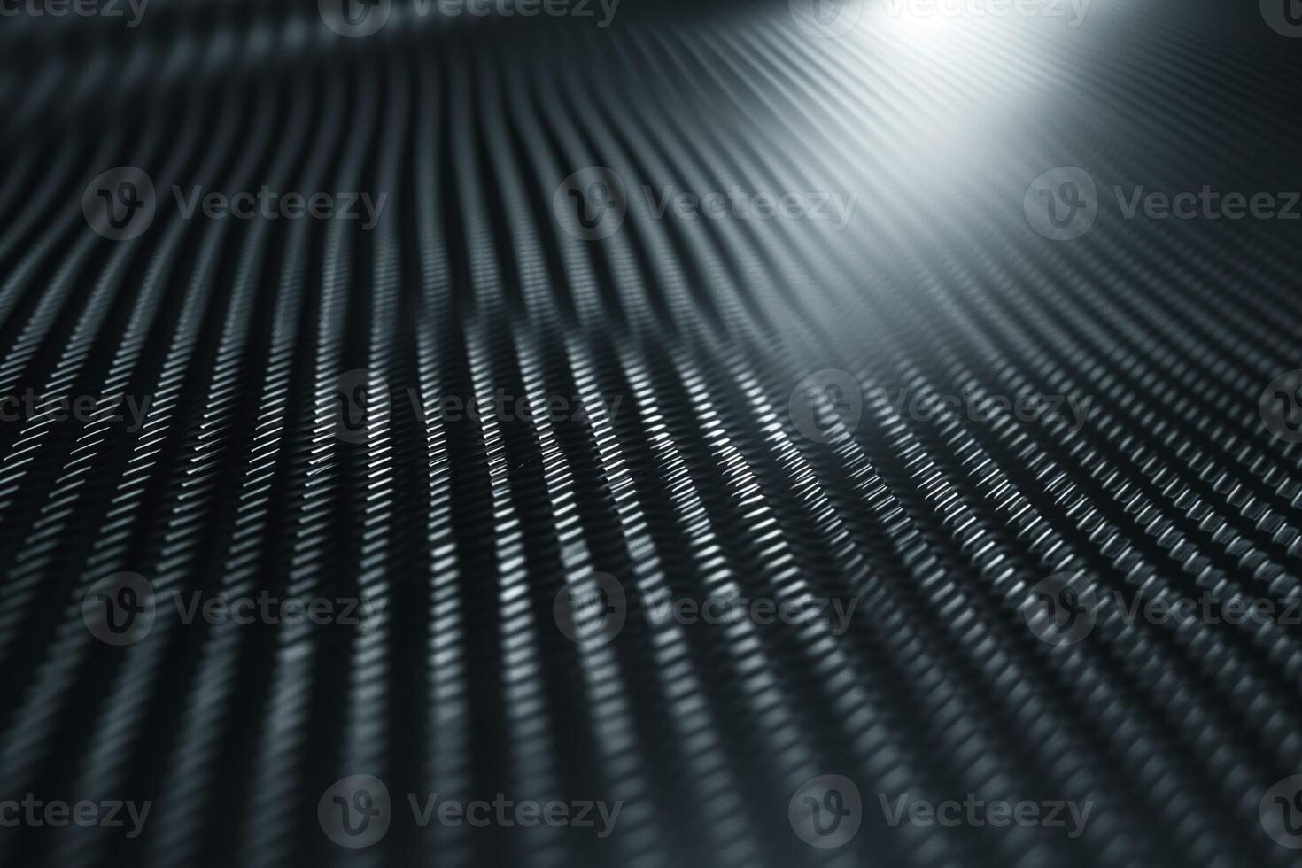 Abstract close-up of a textured surface featuring smooth, flowing grooves in shades of black and gray. photo