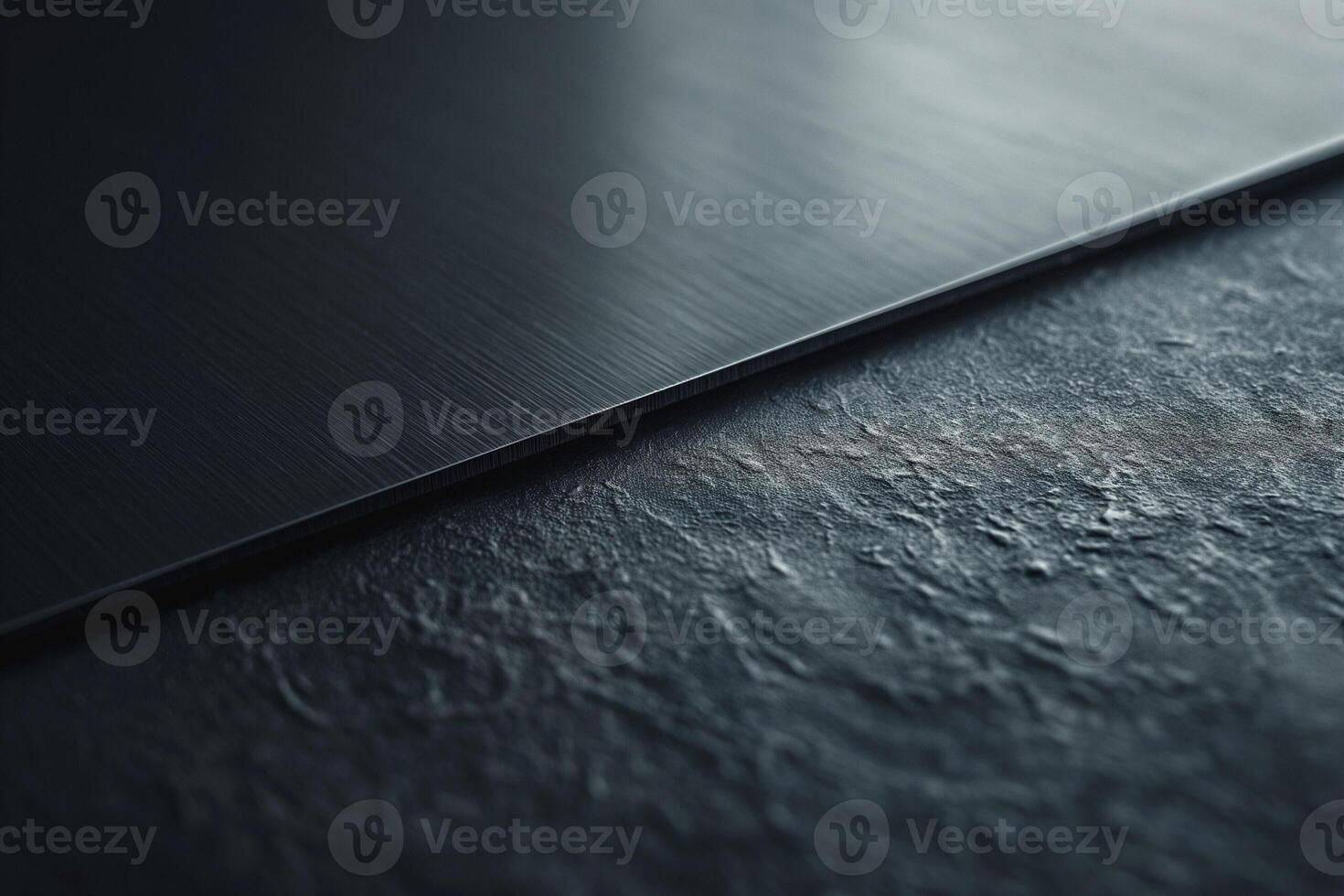 Close-up of a sleek, brushed metal surface merging with a textured stone background. photo