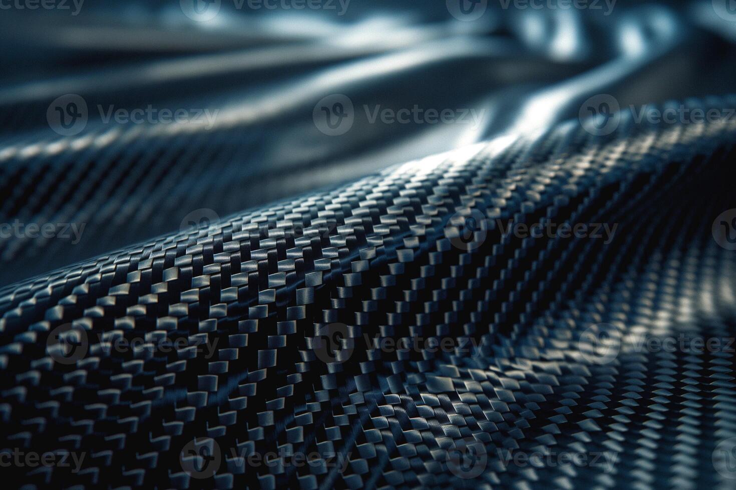 Close-up view of textured black fabric creating a dynamic flow effect. photo