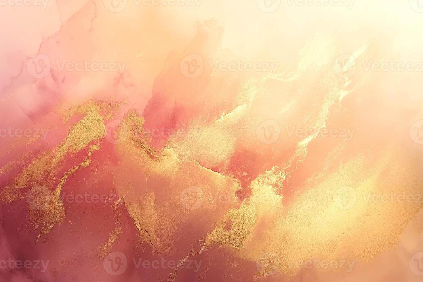 A soft and ethereal blend of pink and gold hues creates a calming abstract background. photo