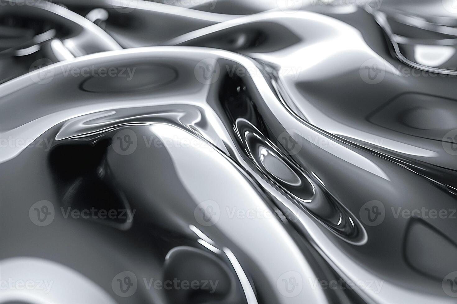 Abstract close-up of smooth, reflective surfaces showcasing fluid shapes and a monochrome palette. photo