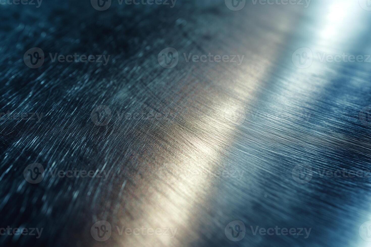 Close-up of brushed metal surface showcasing subtle reflections in cool tones. photo