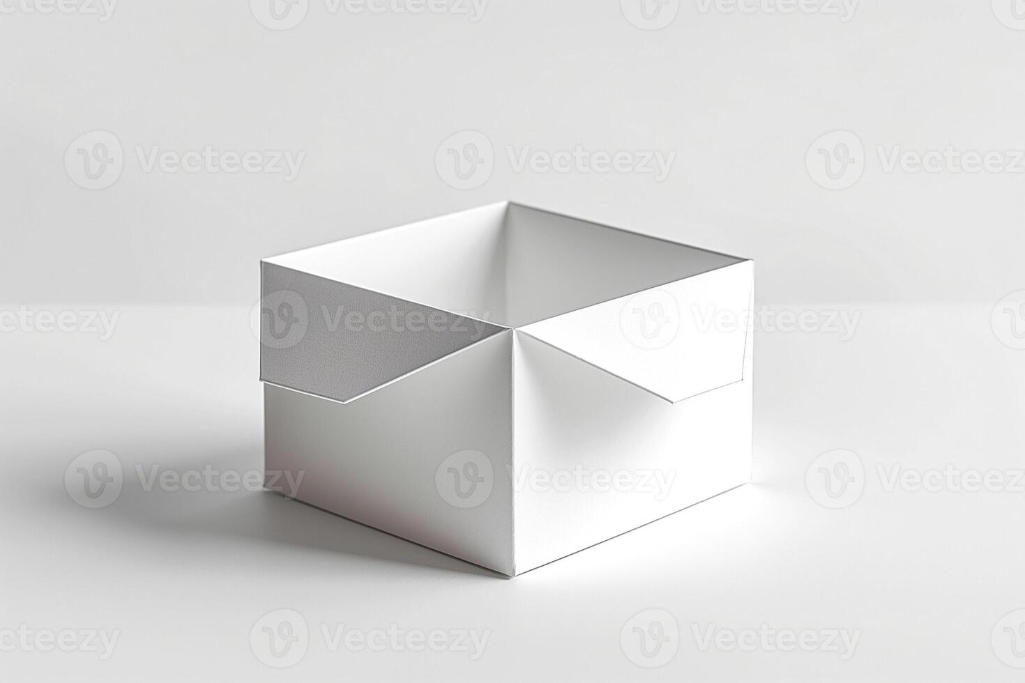 A simple, elegant white origami box, unfilled and perfectly folded, showcasing minimalism. photo