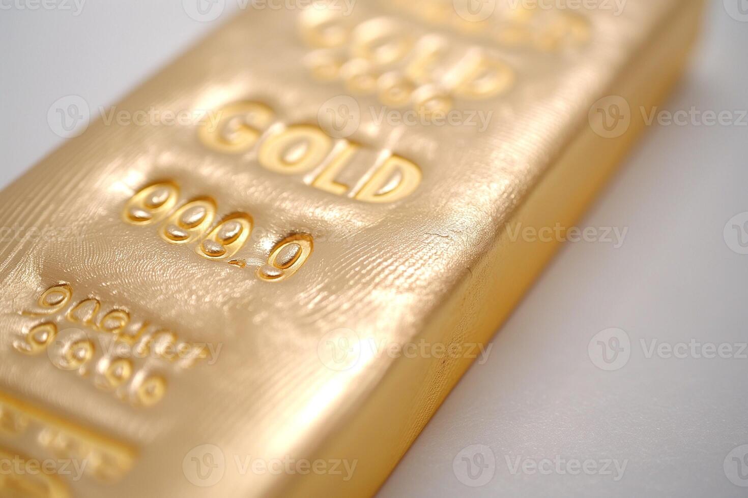 A close-up of a bar of gold, showcasing its gleaming surface and intricate engravings. photo