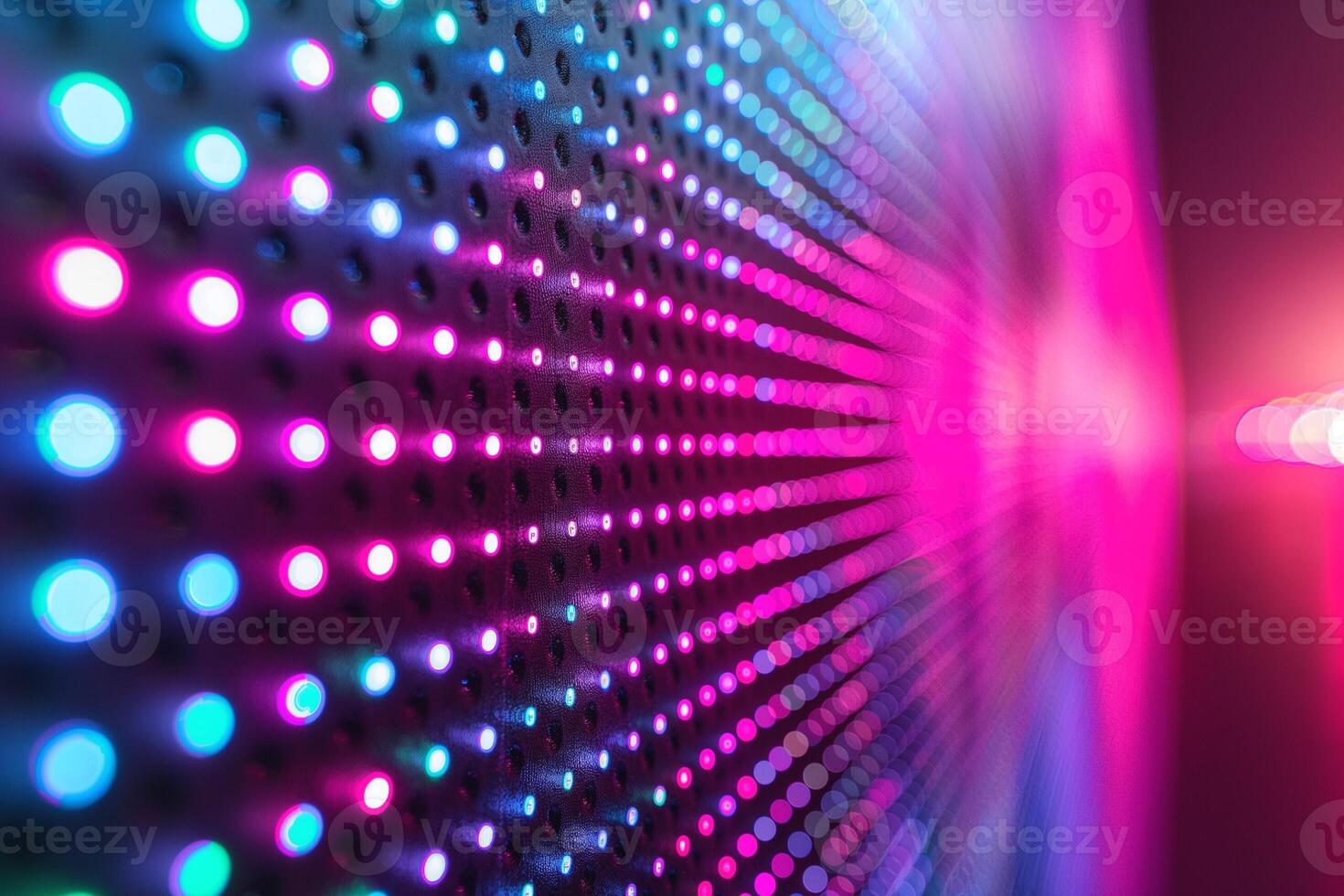 Vibrant abstract pattern of colorful LED lights in pink and blue hues creating a dynamic mood. photo