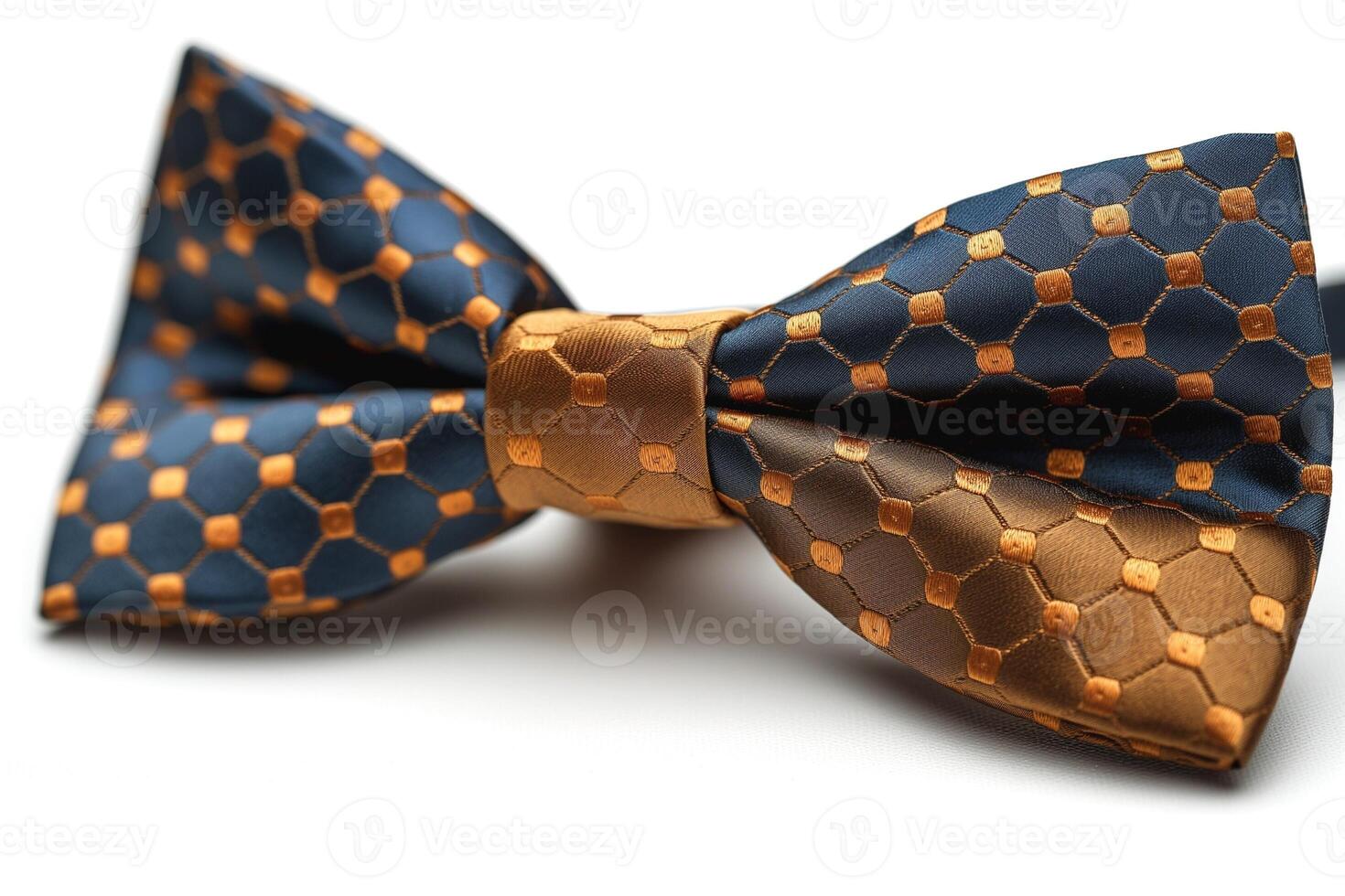 Stylish navy and gold patterned bow tie, perfect for formal occasions or adding a touch of elegance to any outfit. photo