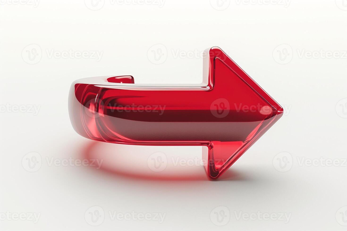A glossy, three-dimensional red arrow pointing to the right, symbolizing direction and movement. photo