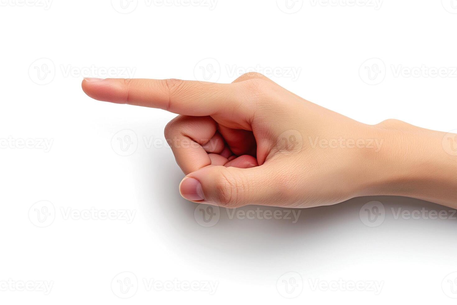 A close-up of a human hand pointing with a slender index finger, set against a minimalistic white background. photo