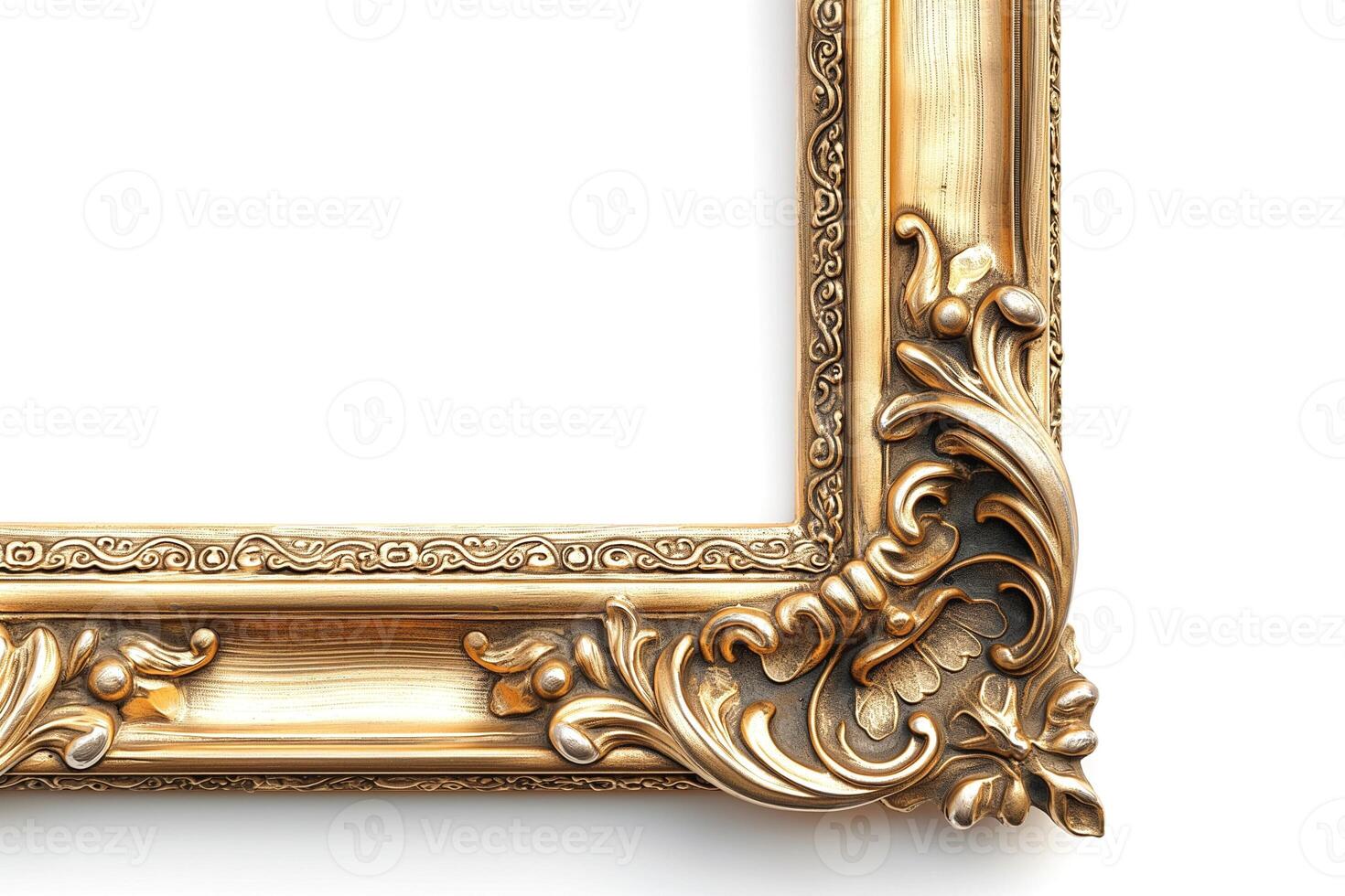 An ornate golden picture frame featuring intricate floral designs, perfect for displaying a cherished memory. photo