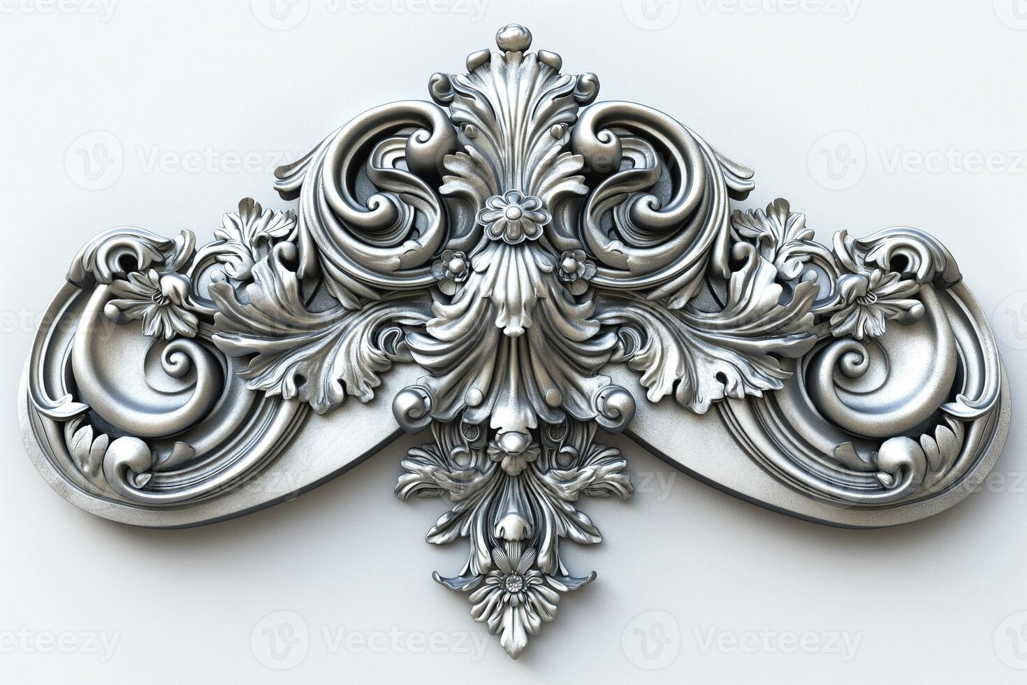 Ornate silver embellishment featuring intricate floral patterns and curves. photo