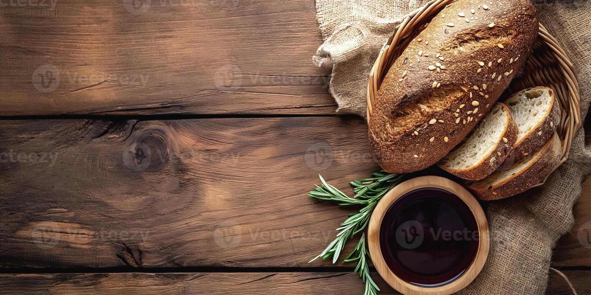 Artisan whole grain bread with a side of red wine, showcasing rustic colors and natural textures, perfect for a cozy gathering. photo