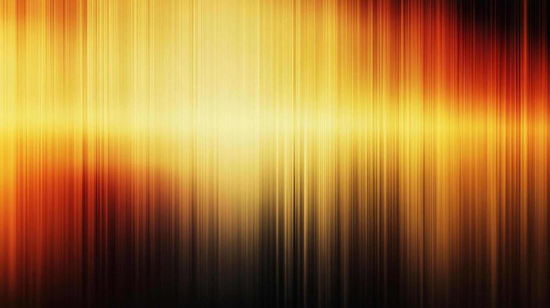 Abstract light and shadow patterns in golden hues create a modern and warm composition. The vertical lines and color gradient add depth. photo