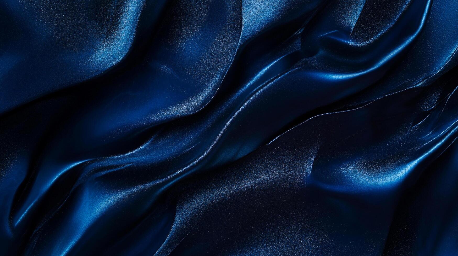 Abstract deep blue, luxurious fabric with delicate, shimmering folds and glossy texture catches light, emphasizing its elegant, silky drape. photo