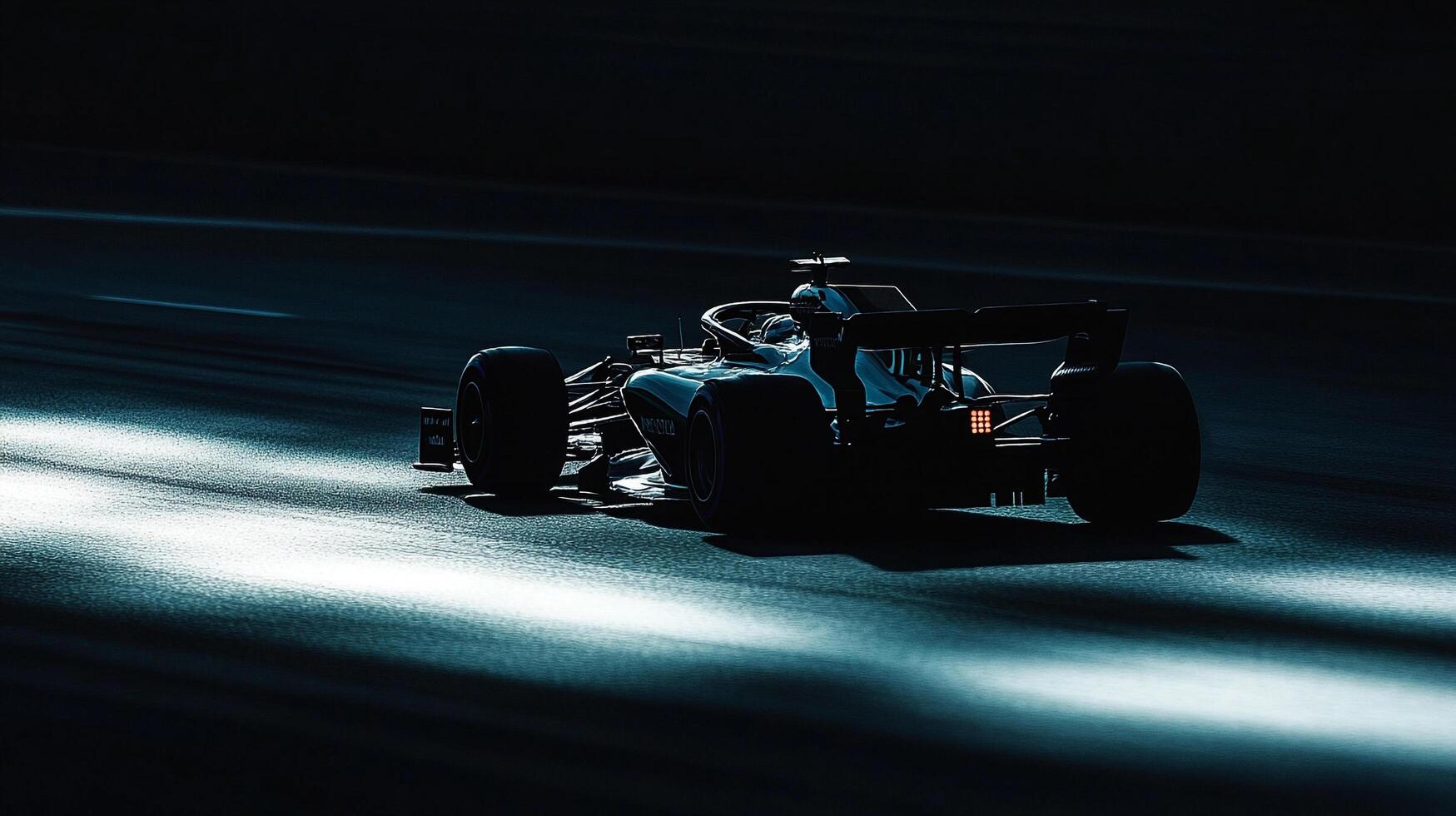 Sleek racing car speeding across a dark track, its silhouette sharply defined against the diffused light, conveying speed and agility. photo