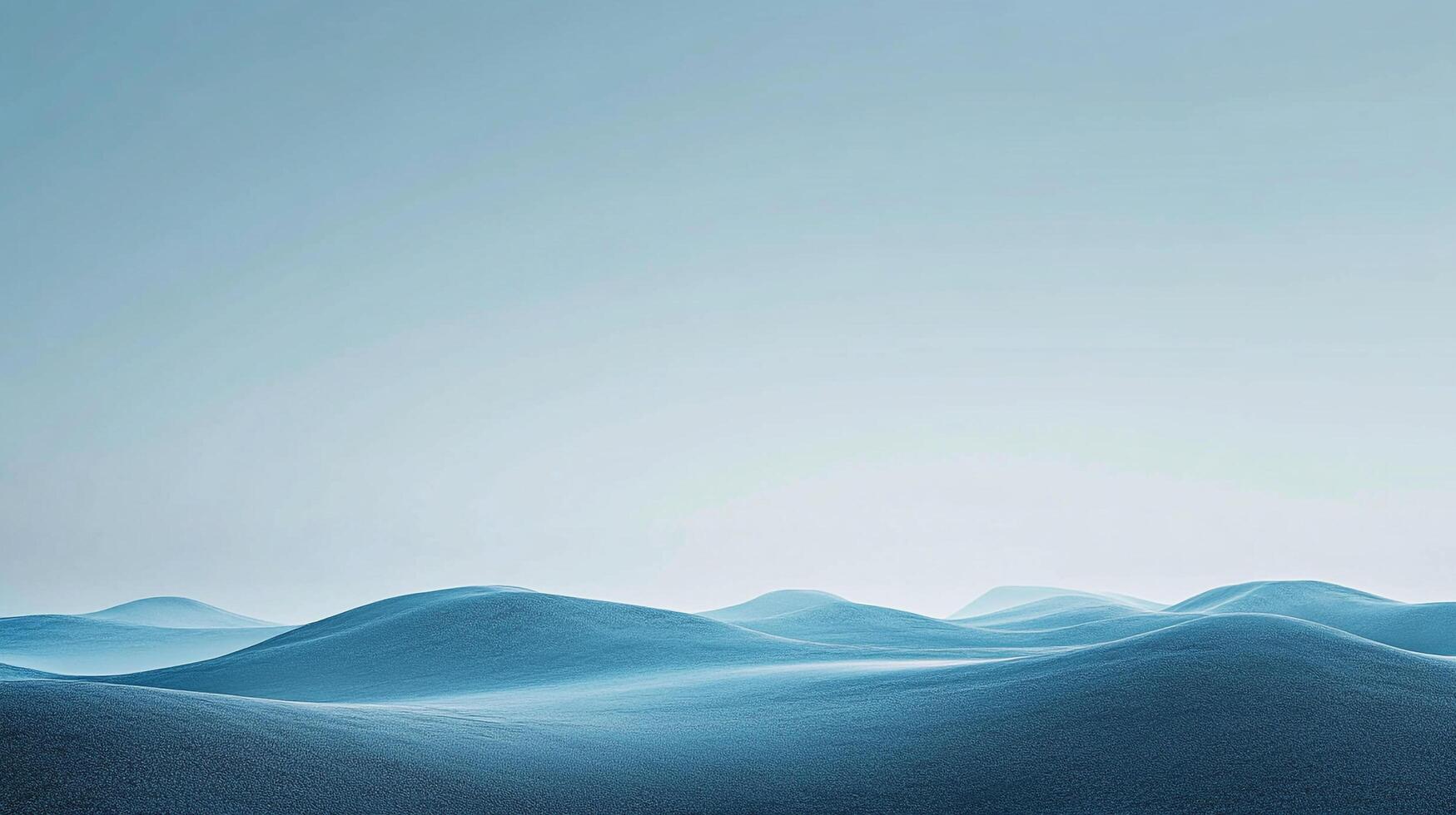 Abstract blue waves under a hazy sky, evoking a sense of tranquility and vastness. A minimalist landscape with soft, dreamlike qualities. photo