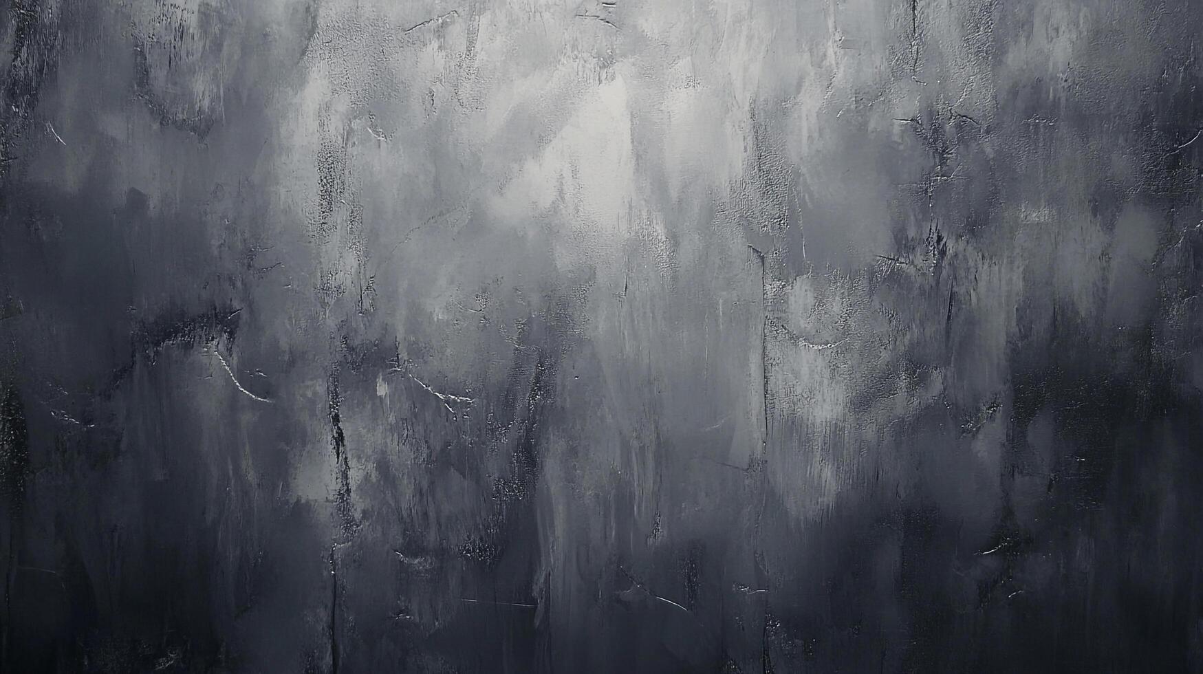 Monochromatic textured surface in shades of gray and black, creating a dramatic and moody abstract. Light reflects unevenly. photo