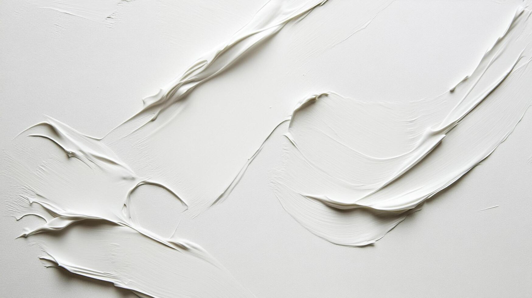 Abstract textured background of white paint or cream. Thick, glossy strokes create a flowing, organic pattern over a clean, bright surface. photo