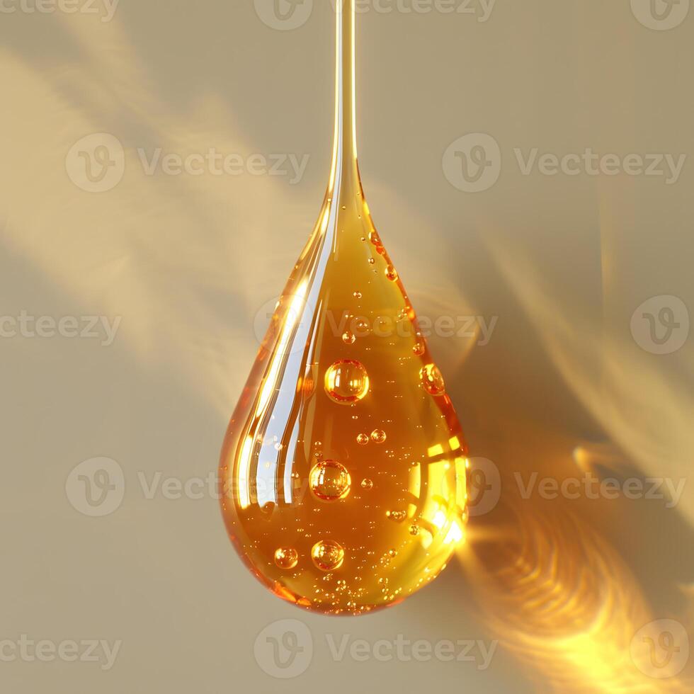 Golden Honey Drop Close-Up with Light Reflections and Bubbles photo