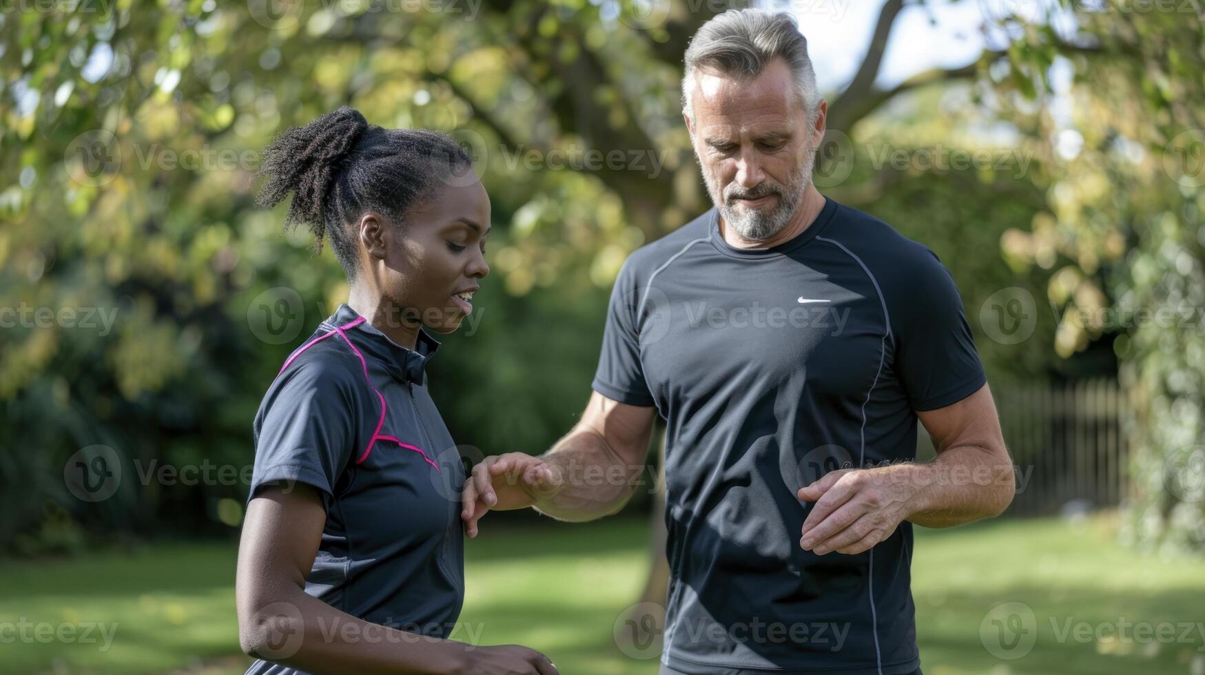 A man and woman are talking while running photo
