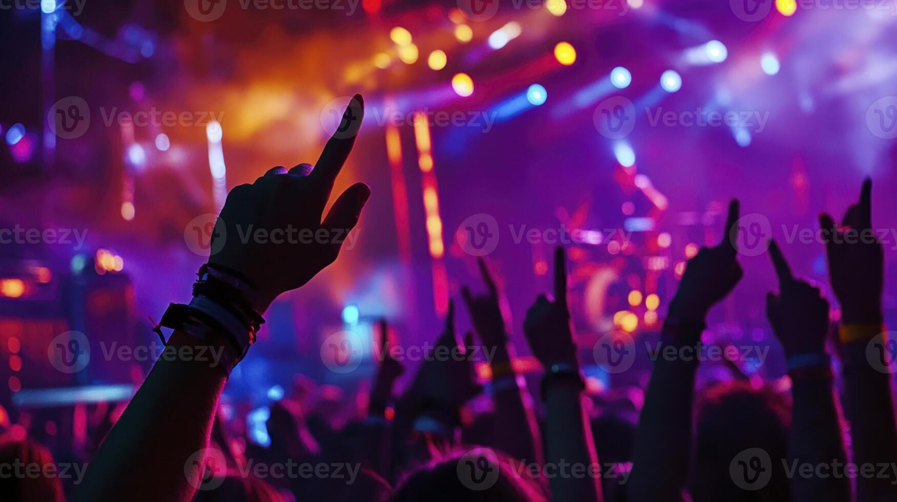 Hands up in the air at a concert photo