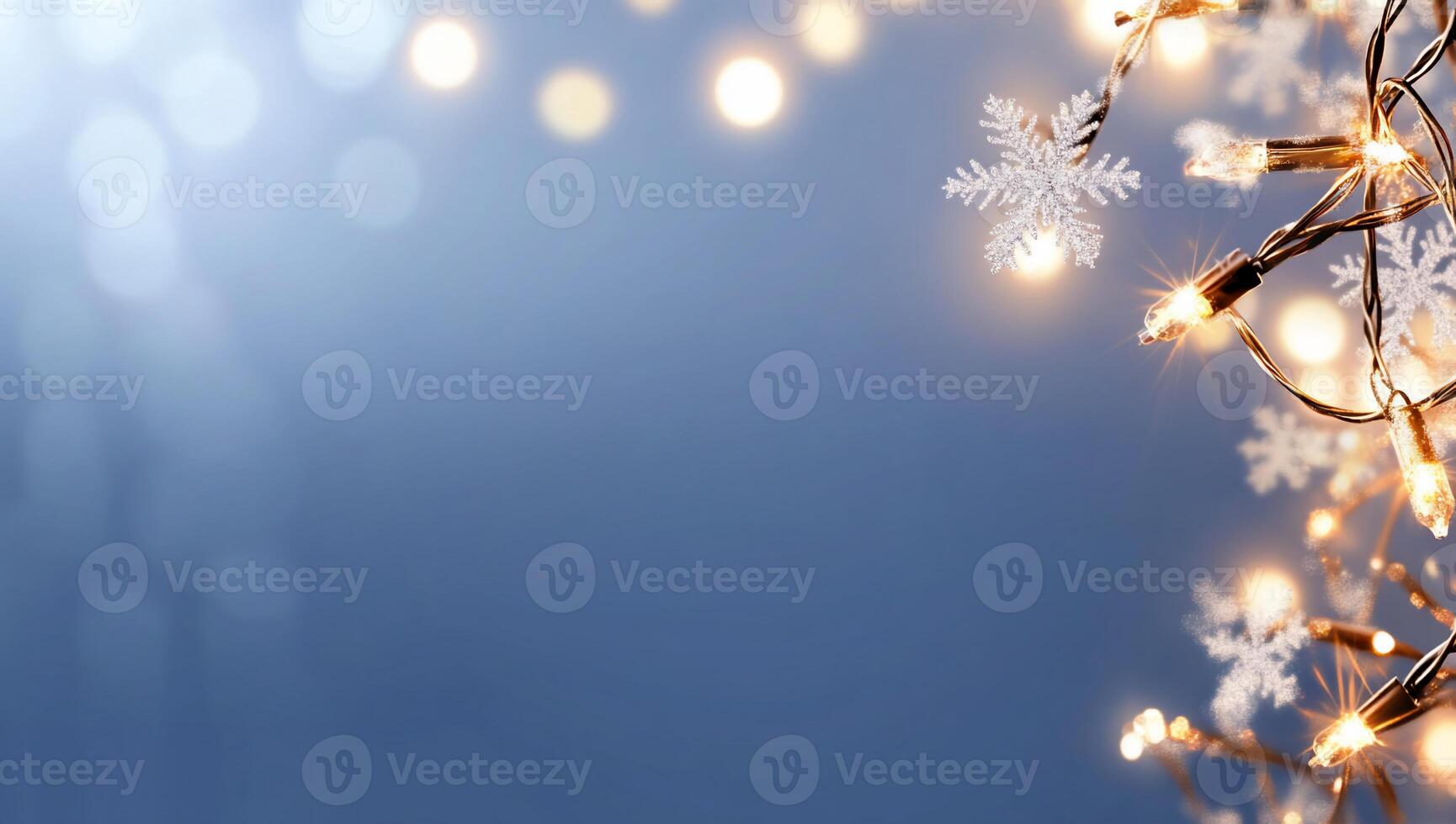 A festive background with snowflakes and twinkling lights. photo
