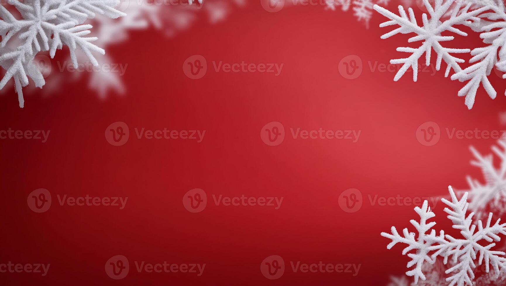 A festive red background adorned with white snowflakes for holiday themes. photo
