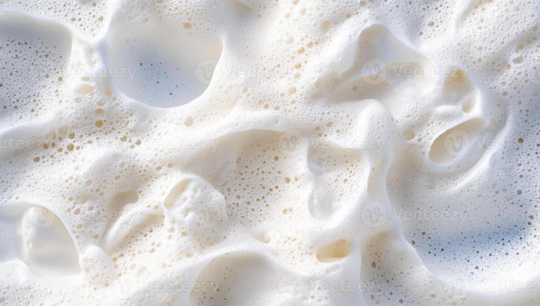 A close up of a white foam with bubbles photo