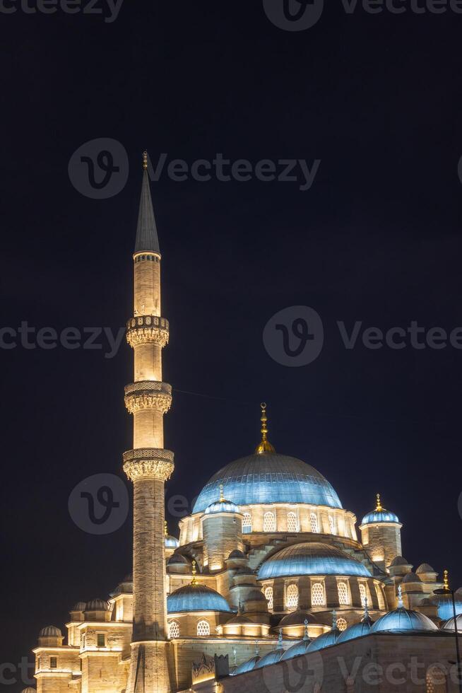 Ramadan or islamic concept. Eminonu Yeni Cami or New Mosque vertical photo