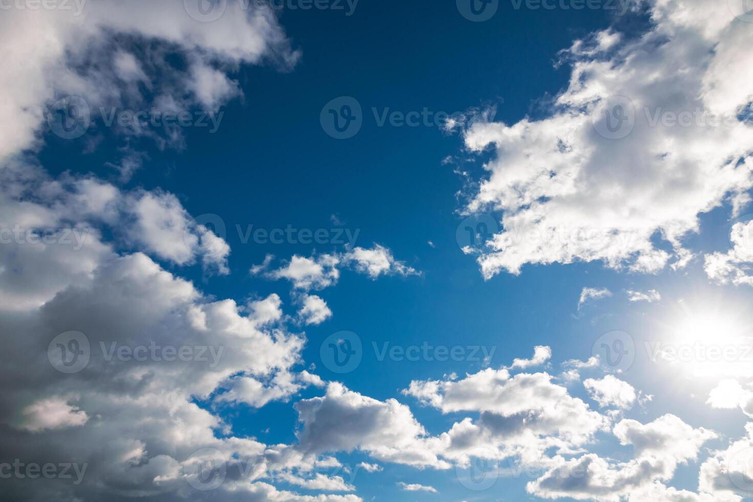 Partly cloudy sky background photo. Weather forecast concept. photo