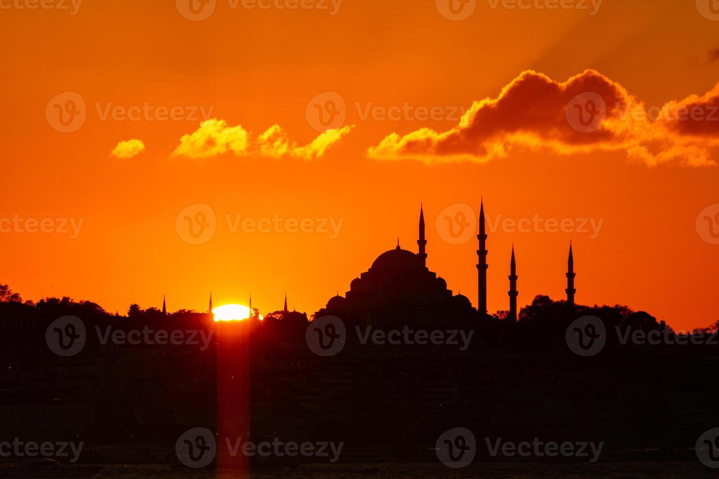 Silhouette of Suleymaniye Mosque at sunset. photo