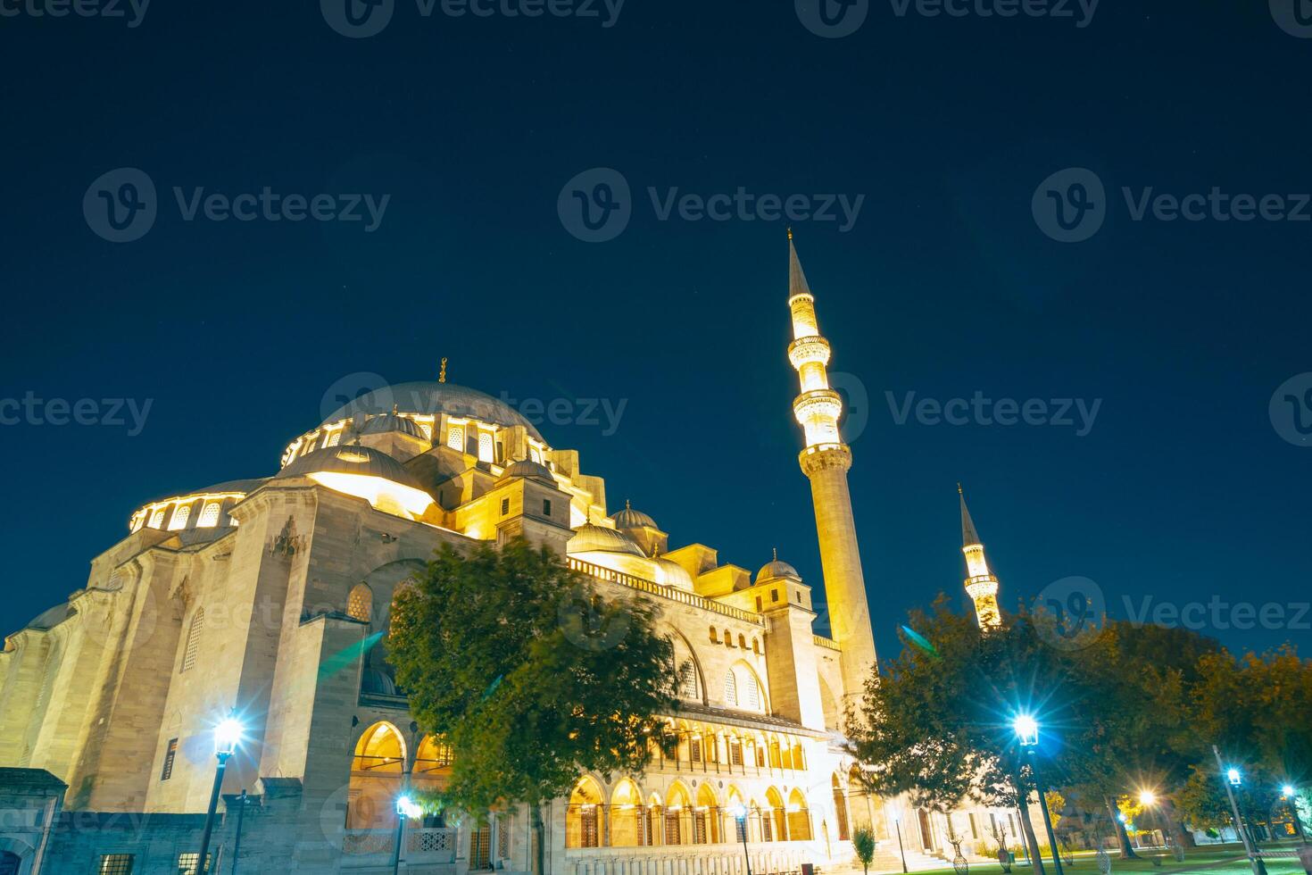 Islamic or ramadan background photo. Suleymaniye Mosque view at night. photo