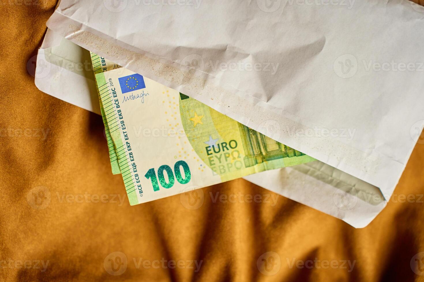 Euro banknotes in envelope. Corruption and illegal cash payments photo