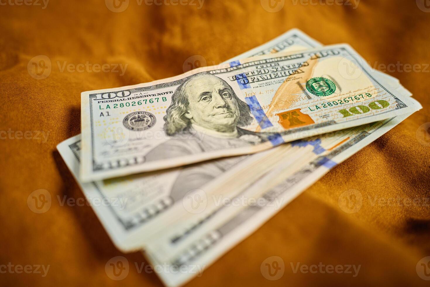 Stack of US dollar bills, close-up photo