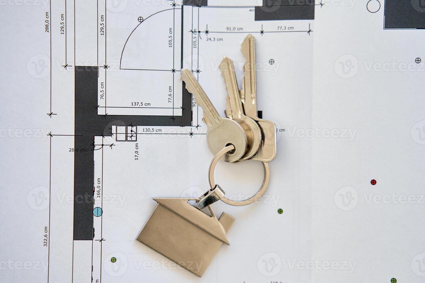 House keys on architectural blueprint photo