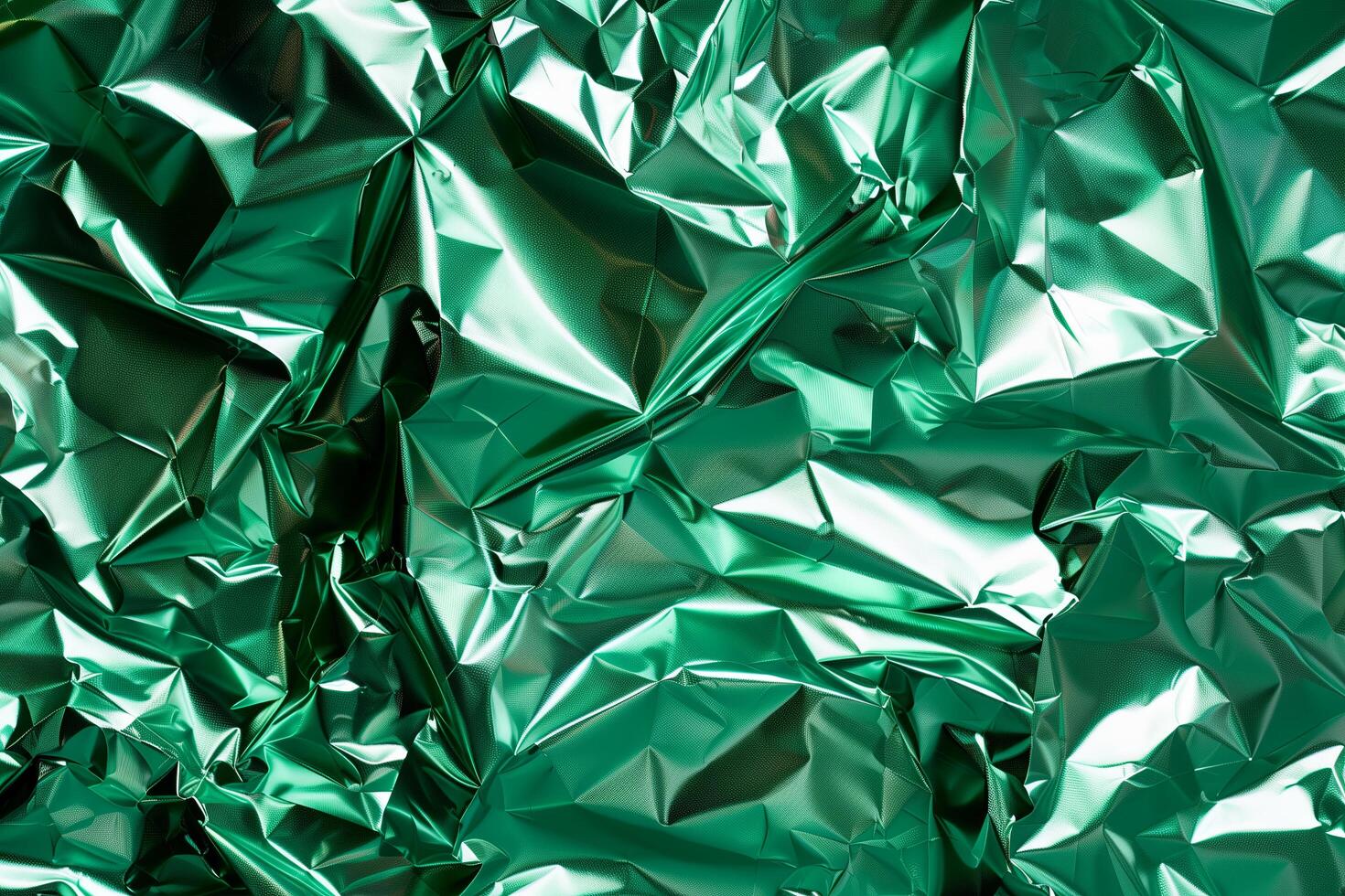 Crumpled metallic green paper texture photo