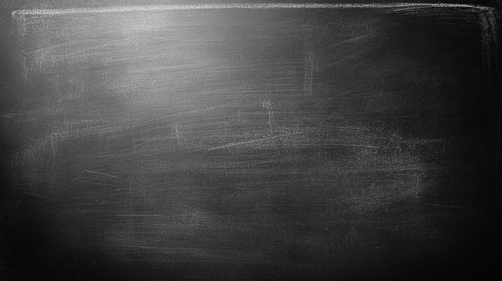 A textured surface with remnants of chalk dust creates a visually interesting pattern and gradient, perfect for backgrounds or overlays. photo