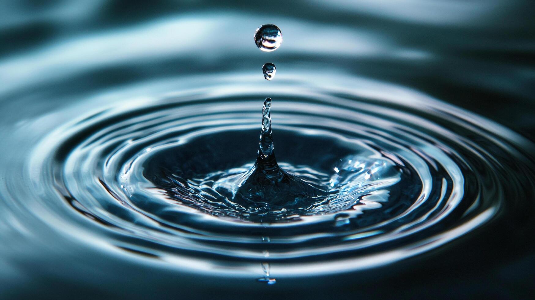 Captivating capture of a water droplet impacting water, showcasing ripples and serene tranquility through a close-up, artistic perspective. photo