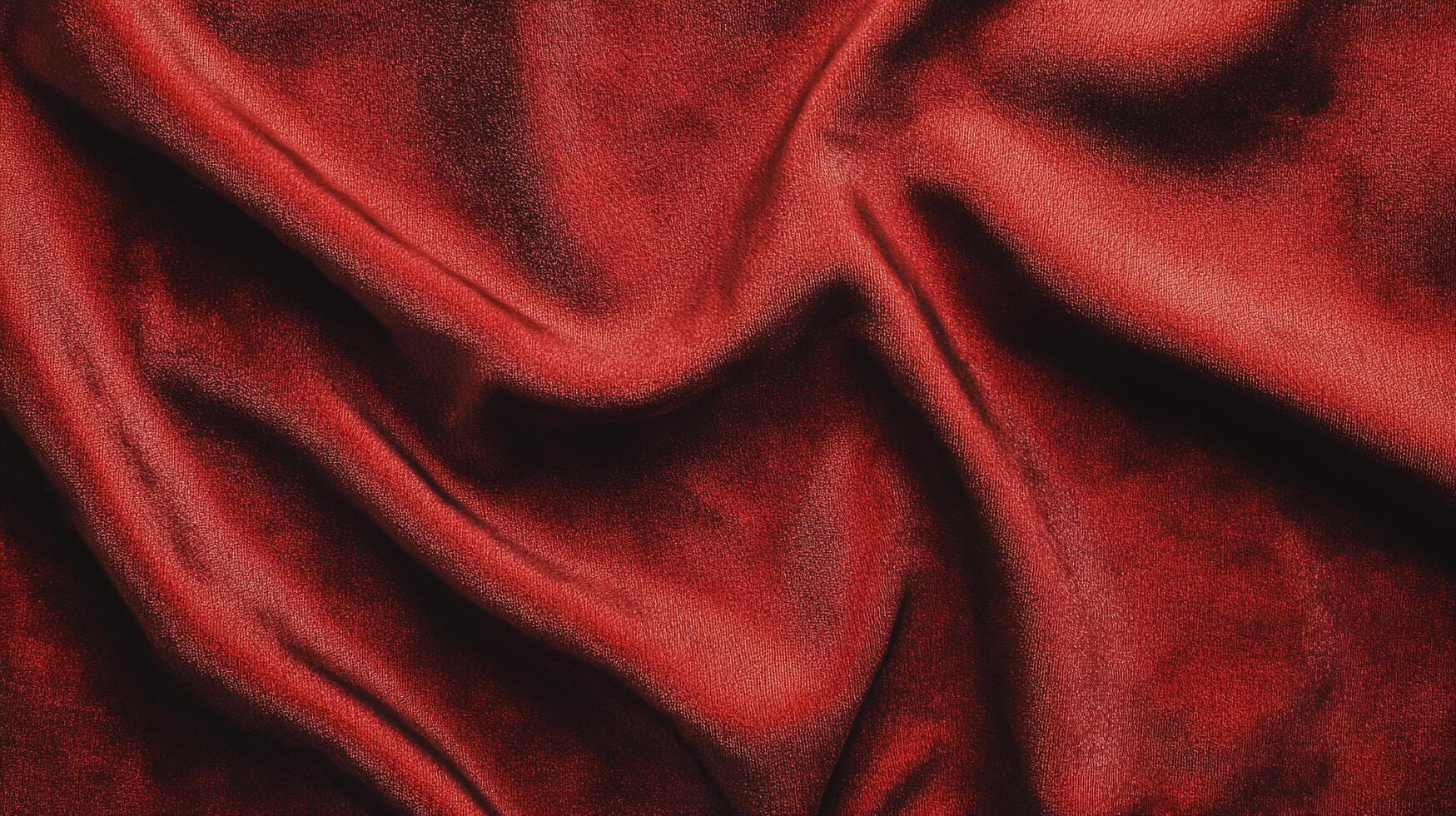 Elegant crimson fabric waves, offering a luxurious and soft texture. Perfect for sophisticated designs with a rich, bold appeal. photo