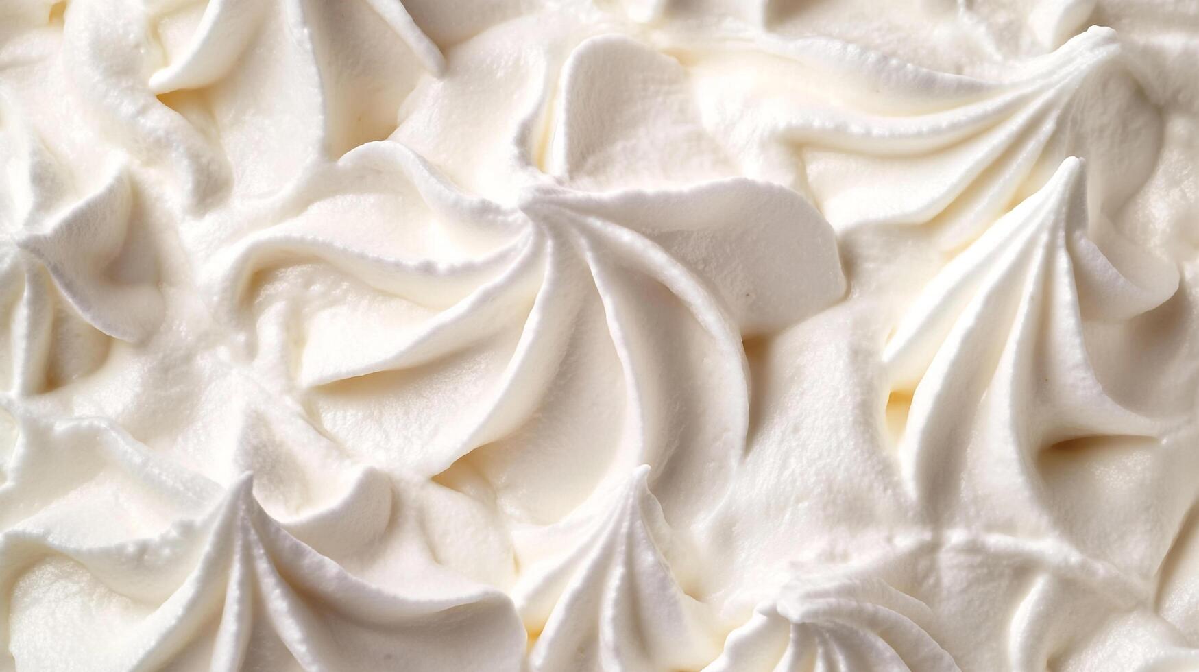 A luscious landscape of swirling white cream, a decadent dream, textured and inviting, promising sweet delight. Creamy peaks beckon. photo