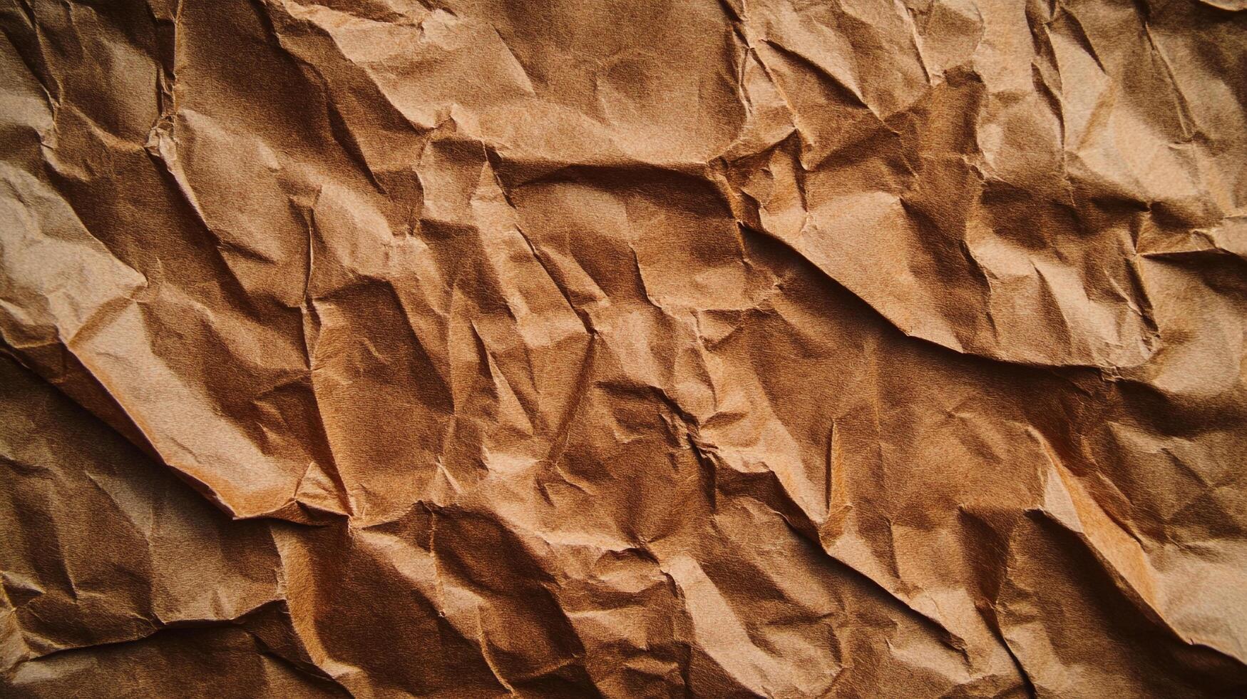 Brown crumpled paper texture with sharp shadows creating abstract patterns, perfect for a rustic or vintage background, detailed backdrop. photo